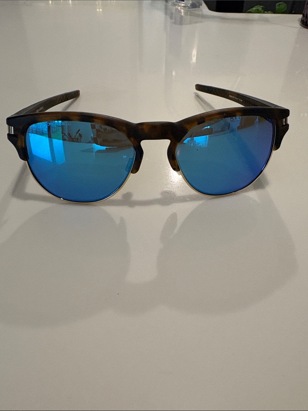 Oakley Latch Key Sunglasses Matte Brown Tortoise frame with Sapphire Iridium